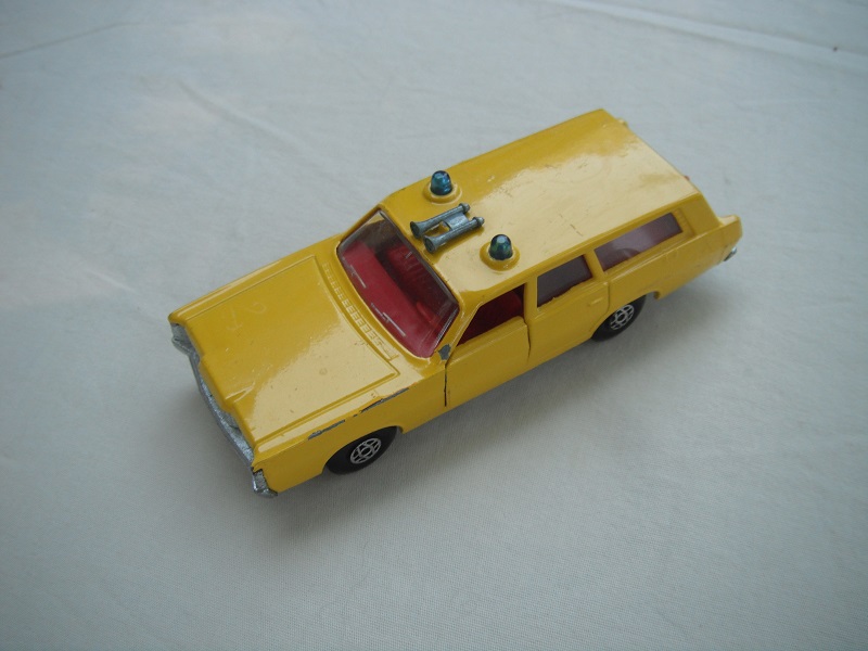 3. Yellow body/silver base/spiro wheels/clear windows/red interior/no labels/PP.