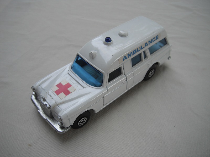 2. White body/black speedkings base/spiro wheels/blue windows/white interior/&quot;Ambulance&quot; on sides/straight red cross label.