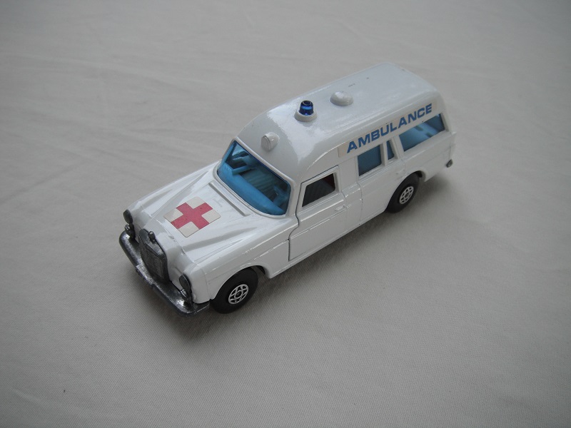 1. White body/black superkings base/spiro wheels/blue windows/white interior/&quot;Ambulance&quot; on sides/rounded red cross label.