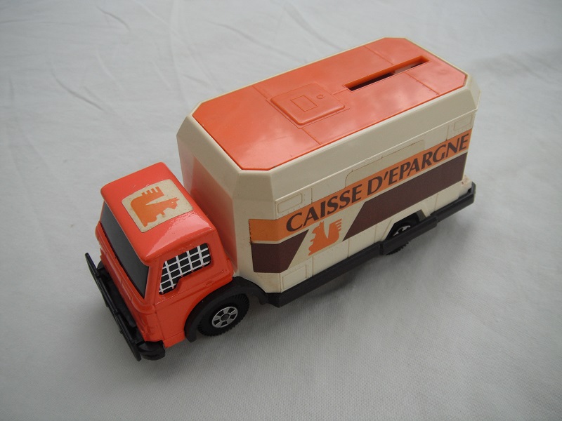 4. Salmon cab/cream container/org roof/dk.brn base/Lesney England/5 spk whls/dk.org axle covers/blk windows w/mesh/Caisse D'Epargne.