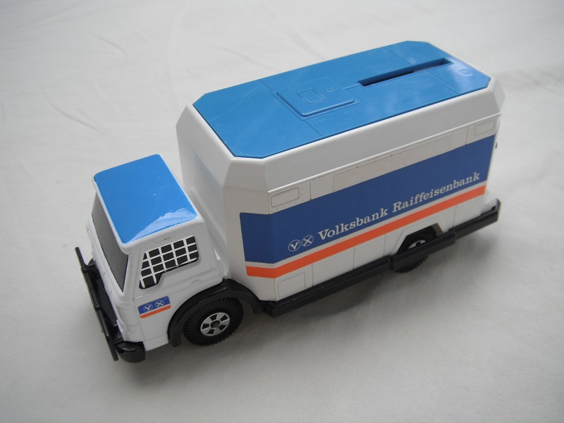 1. White cab/white container/blue roof/blk base/Lesney England/5 spk whls/blu axle covers/blk windows w/mesh/Volksbank.