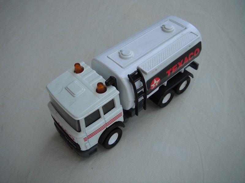 4. White cab &amp; tank/gray Macau base/white 8 dot disc whls/clr windows/black interior/Texaco labels/2R 1789 on rear.