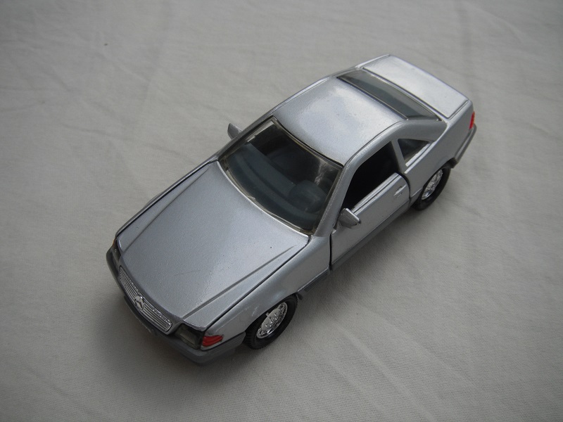 5. Silver body/gray base/chrome dish wheels/lt.amber windows/dk.gray interior/lt.amber headlights/dk.orange sidelights.