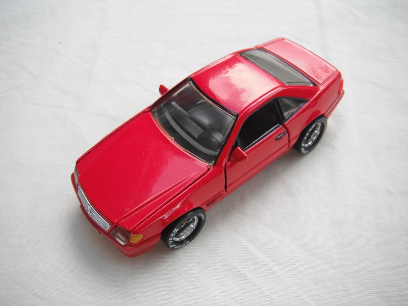 2. Red body/maroon base/star dish wheels/clear windows/dk.gray interior/clear headlights/amber sidelights.