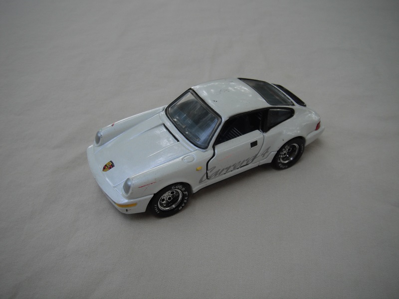 4. Pearly white body/detailed gloss black China base/5 hole deep dish whls/clear windows/dk.blue interior/Carrera 4/Prepro.