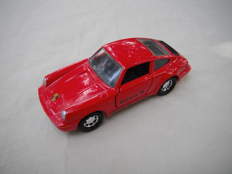 1. Red body/black Macau base/interior/7 spoke deep wheels/clear windows/black interior/Carrera 4 Porsche.
