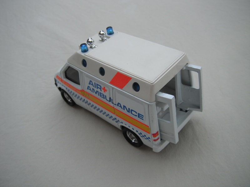 k169A Ford Transit Ambulance opening rear doors.jpg