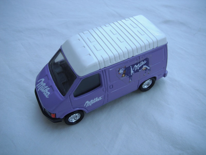 1. Lavender body/white roof/black Macau base/chrome 8 dot disc wheels/clear windows/back interior/Milka.