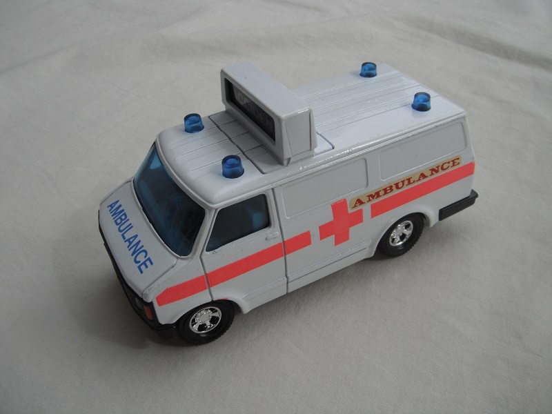 3. White body/blk base Macau (large)/5 spoke mag whls/blue windows/gray int/message board cast on roof/red cross/Ambulance front and sides.