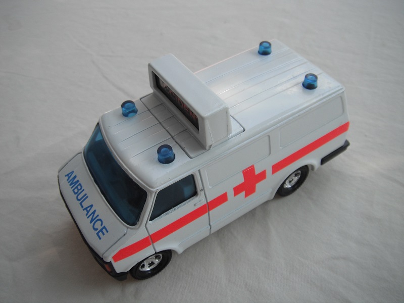 2. White body/blk base Macau (large)/5 spoke mag whls/blue windows/gray int/message board cast on roof/Ambulance &amp; red cross.