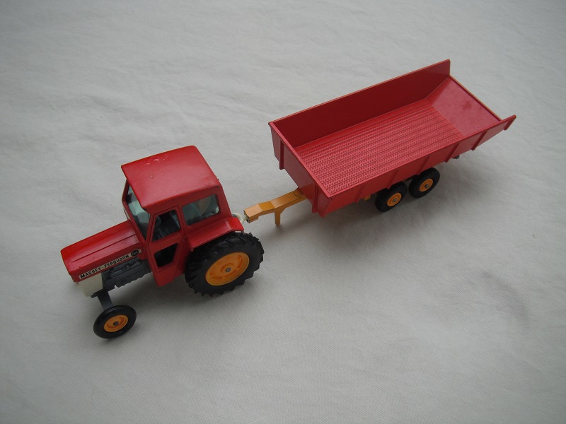 5. Red &amp; yellow tractor/gray base/BPT w/yellow hubs/Trailer w/textured red bed/dk.yellow base #2.