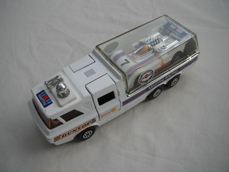 12.White body/clear canopy/white tailgate/silver base/MC whls/amber windows/blk int/Dunlop/Martini Racing/MB56 Hi Tailer.