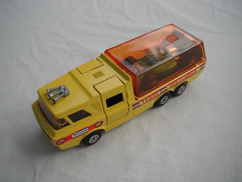 10.Yellow body/orange canopy/red tailgate/sil base/MC whls/smoked windows/blk int/chrm lts/Team Matchbox/green MB24B.