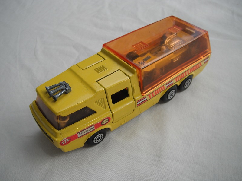 5. Yellow body/orange canopy/red tailgate/sil base/MC whls/smoked windows/blk int/chrm lts/Team Matchbox/yellow MB34A.