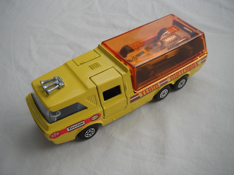 4. Yellow body/orange canopy/dk.red tailgate/sil base/MC whls/clr windows/blue int/chrm lts/Team Matchbox/yellow MB34A.