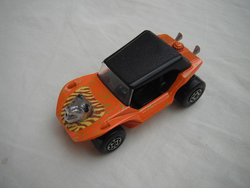 10.Dk.orange body/grn splatter/blk roof/lt.org base/MC whls/clr windshield/blk int/brown stripes &amp; hood ornament.