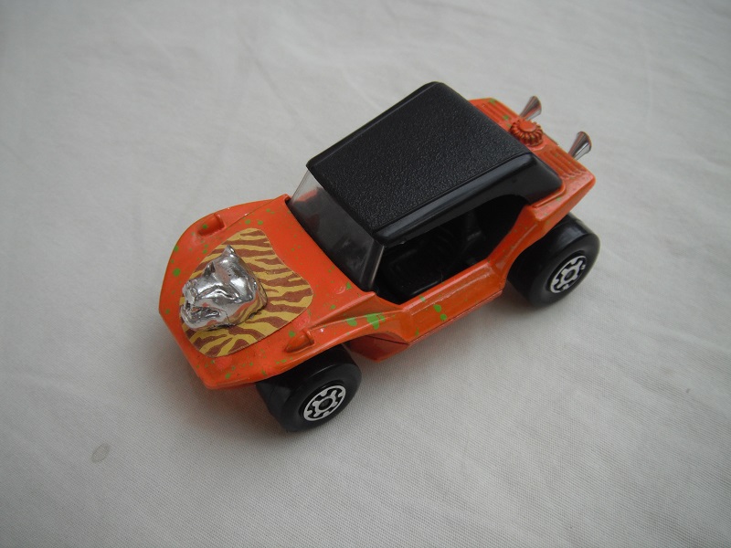 9. Dk.orange body/grn splatter//blk roof/lt.org base/MC whls/clr windshield/blk int/dk.brown stripes &amp; hood ornament.