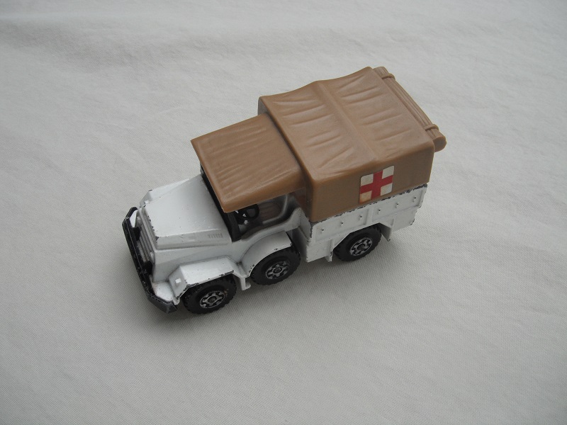 1. White body/matt black BK112 base/tan canvas top/chrome MC wheels/Red Cross labels/PP.