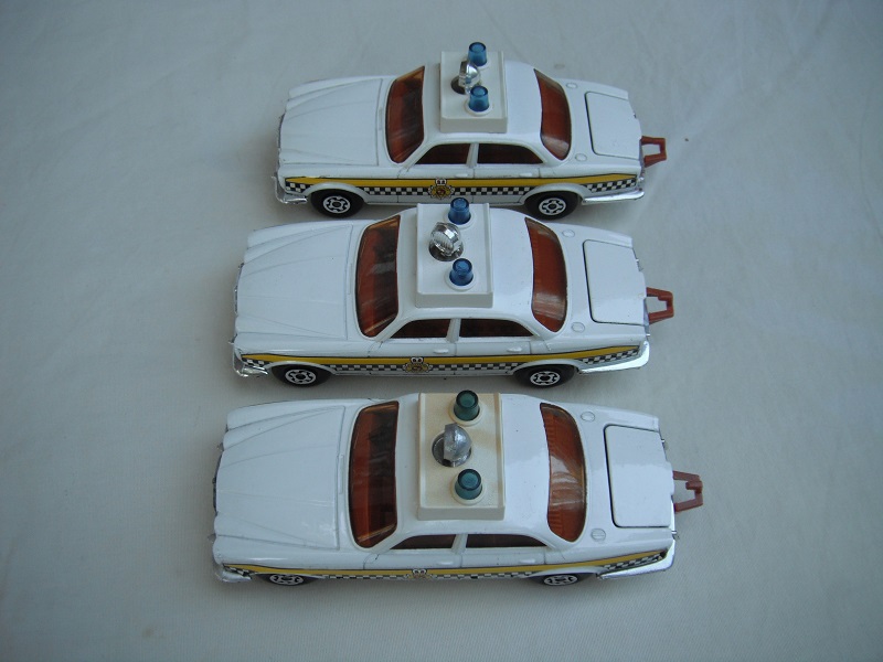 K66A Jaguar XJ12 Police Patrol checker label variations  with MC wheels.jpg