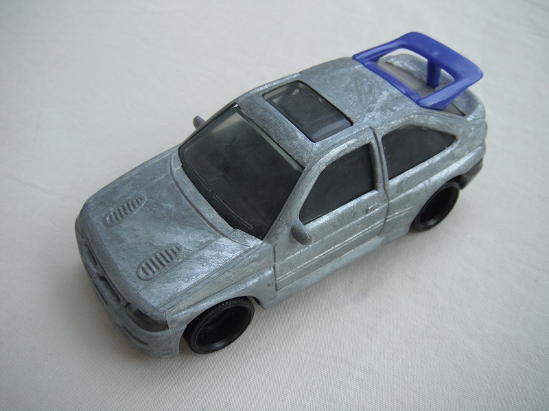 2. Unpainted body/black Thailand base/black disc wheels/clear windows/black interior/(PP).