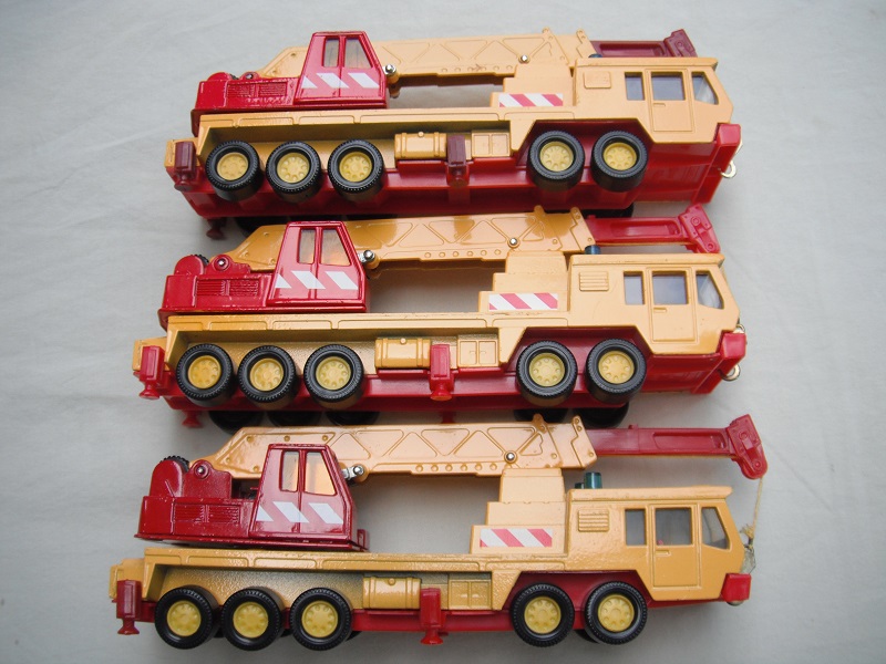 K114B Crane Truck dk.yellow & red group pic#1.jpg
