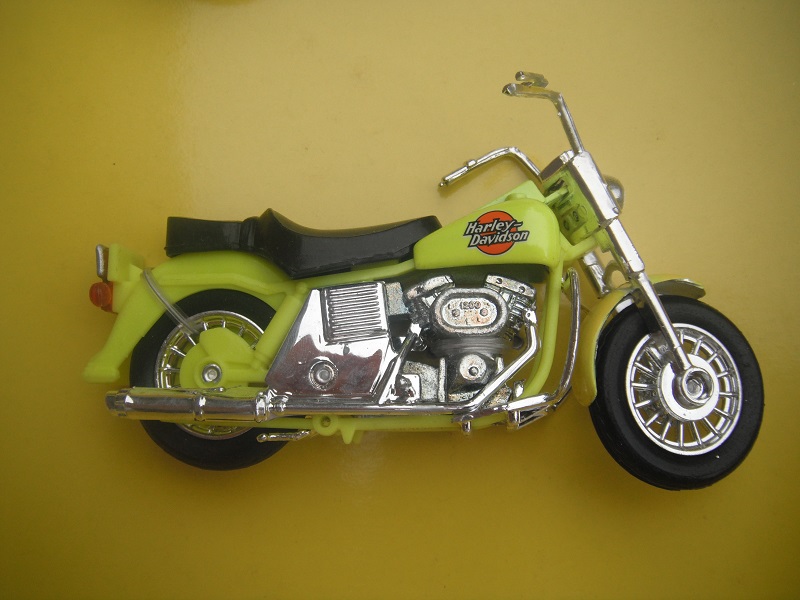 6. Fluorescent yellow/unpainted motor/K-83 China base/Harley Davidson &amp; orange circle (from set No.67112).