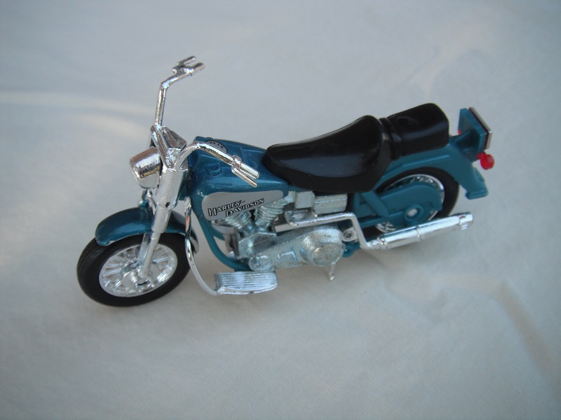 5. Purple body/unpainted motor/K-83 China base/Harley Davidson on silver background.