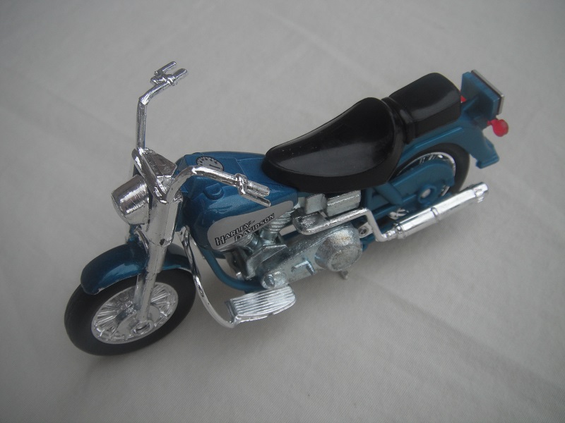 4. Turquoise body/unpainted motor/K-83 Thailand base/Harley Davidson on silver background (from set No.76272).