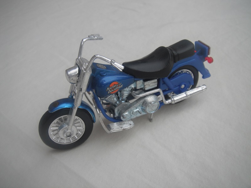 1. Blue body/unpainted motor/K-83 Thailand base/Harley Davidson &amp; orange circle.