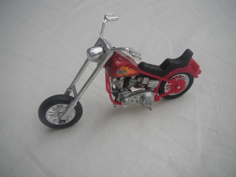 6. Metallic red body/unpainted motor/China base/Harley Davidson &amp; flames.