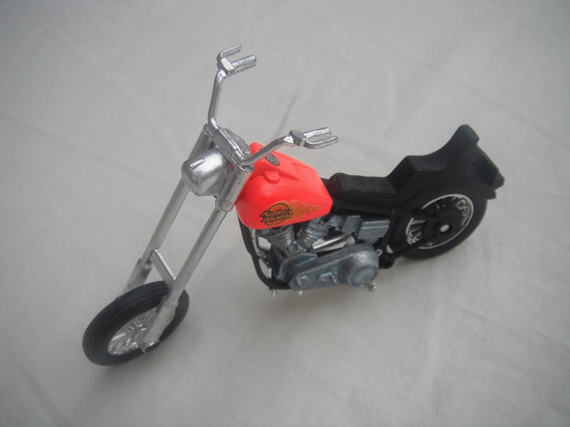 3. Fluorescent red &amp; black body/unpainted motor/Thailand base/Harley Davidson &amp; flames.