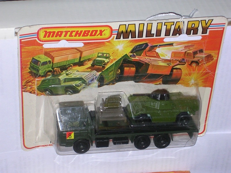 MM2 Armored truck transporter olive drab & blk base No.8 label.jpg