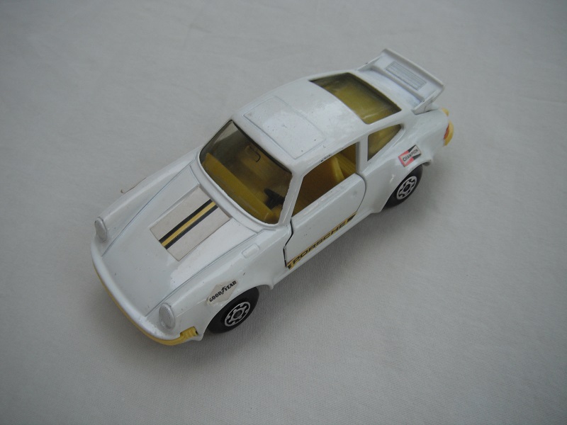 1. PP/White body&amp; base/yellow interior/Maltese cross wheels/no K # /incomplete year of release/England cast.