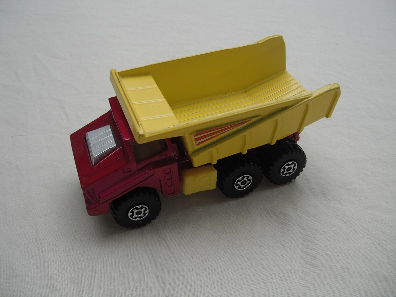 4. Lt.metallic red body/yel dump type a/silver base type a/yellow press-o-matic/MC wheels/amber windows/3 stripes labels.
