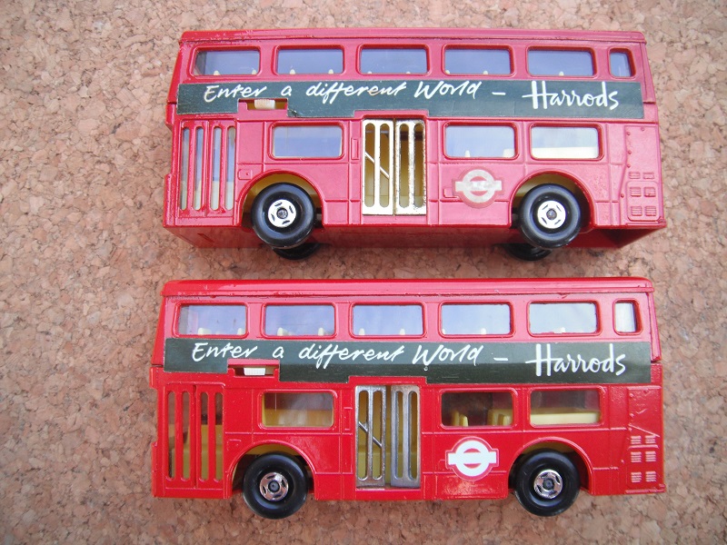 K15B The Londoner (Bus) Harrod's red or dark red body & side door variations.jpg