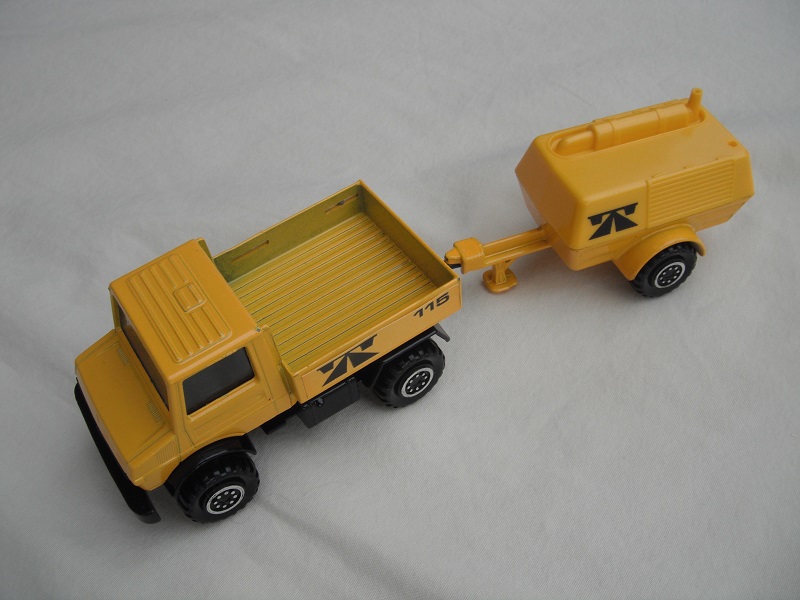 3. Yellow Unimog/K118 matt black Macau base/black interior/&quot;115&quot; to rear/Yellow trailer/K-30 Macau made/black tow eye.