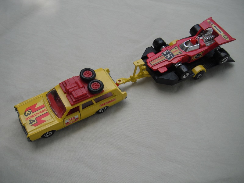 12.Yellow car/unpainted K46 base/dot-dash whls/clr windows/dk.red int/dk.red roof rack/yel &amp; blk superkings tlr/dot-dash whls/red race car &quot;35&quot;.