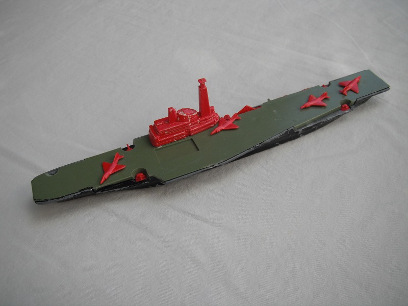 1. Black hull/green deck/red superstructure/K304 Lesney base/red aircraft &amp; guns/PP.