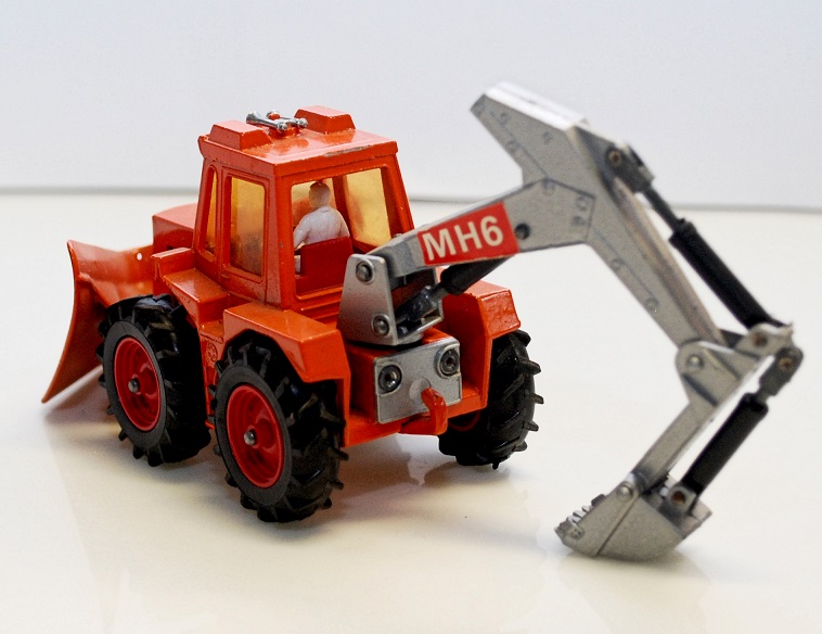 K25B Digger & Plow with silver plate above towing hook.jpg