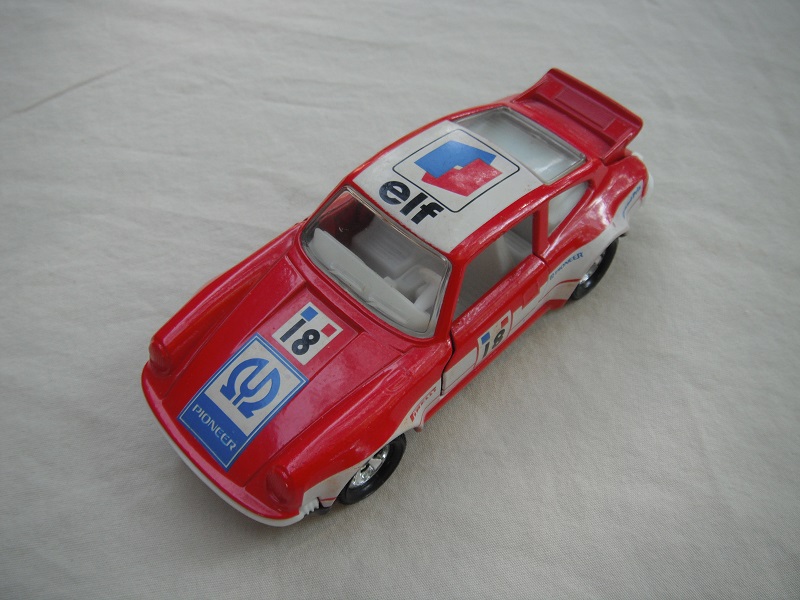 1. Red body/black base K70/Macau casting/5SM wheels/clear windows/white interior/&quot;Elf&quot; on white background.