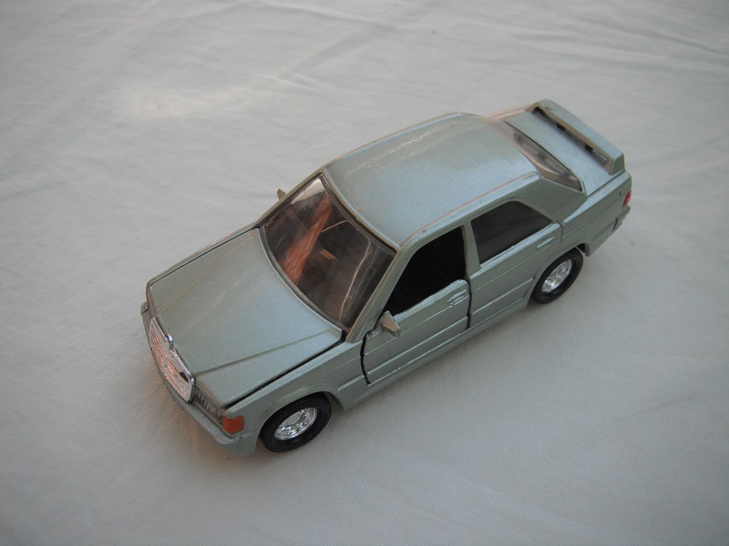 13.Thistle green body/black China base/no K#/chrome 8 dot disc wheels/clear windows/blk int/clr headlights/orange painted sidelights.