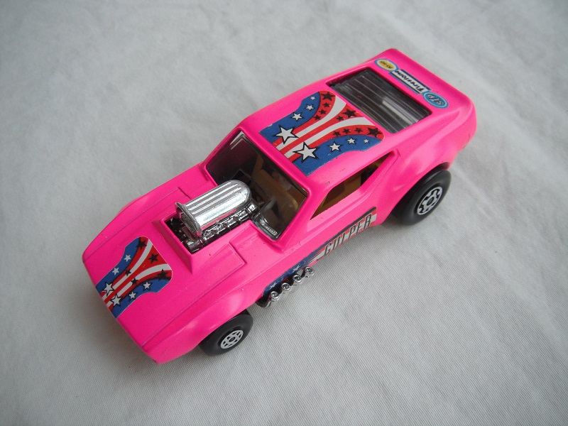 11.Darker med.pink body/cylinder shaped ES/blk base/spiro &amp; MC whls/clr windows/yellow interior/yellow cage/Gulper,stars &amp; stripes/dk.blu lbls.