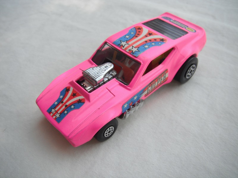 4. Lt.pink body/bell shaped ES/blk base/spiro &amp; MC whls/clr windows/orange interior//yellow cage/Gulper,stars &amp; stripes/blue lbls.