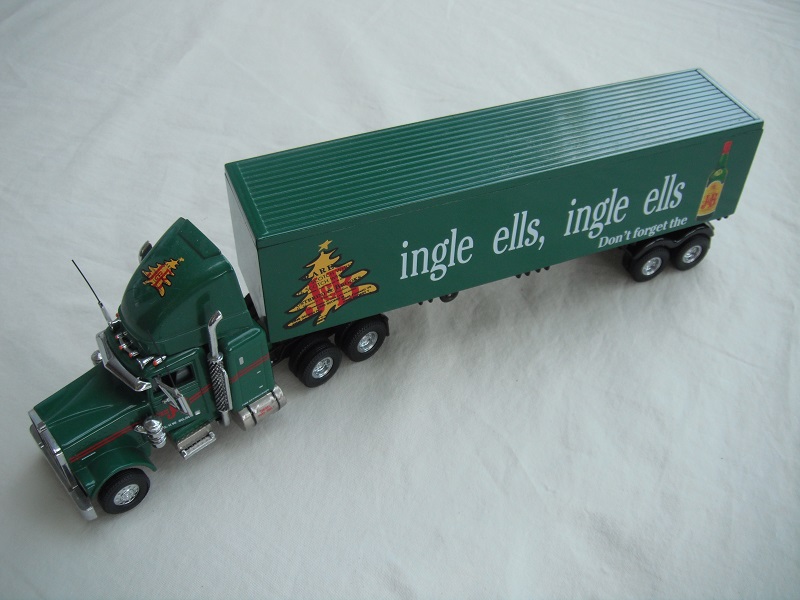 2. Green cab/chrome chassis/black rubber tires/green container/&quot;ingle ells ingle ells-Don't forget the J&amp;B&quot; tempa.