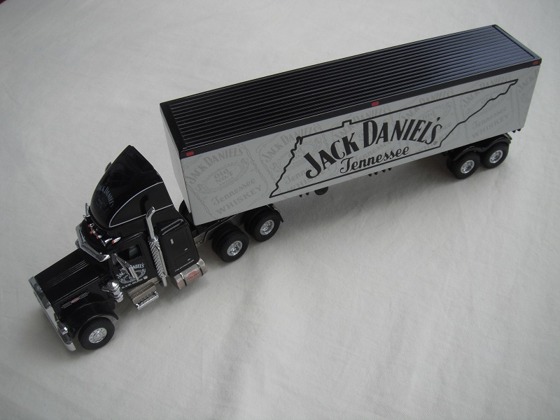 1. Black cab/chrome chassis/black rubber tires/gray container w/black roof/Jack Daniel's Tennessee&quot; tempa.