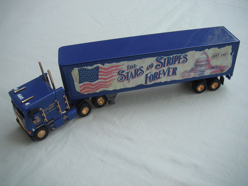 1. Blue cab &amp; container/blue chassis/black rubber tires/&quot;The stars &amp; stripes forever 1897-1997&quot; tempa.