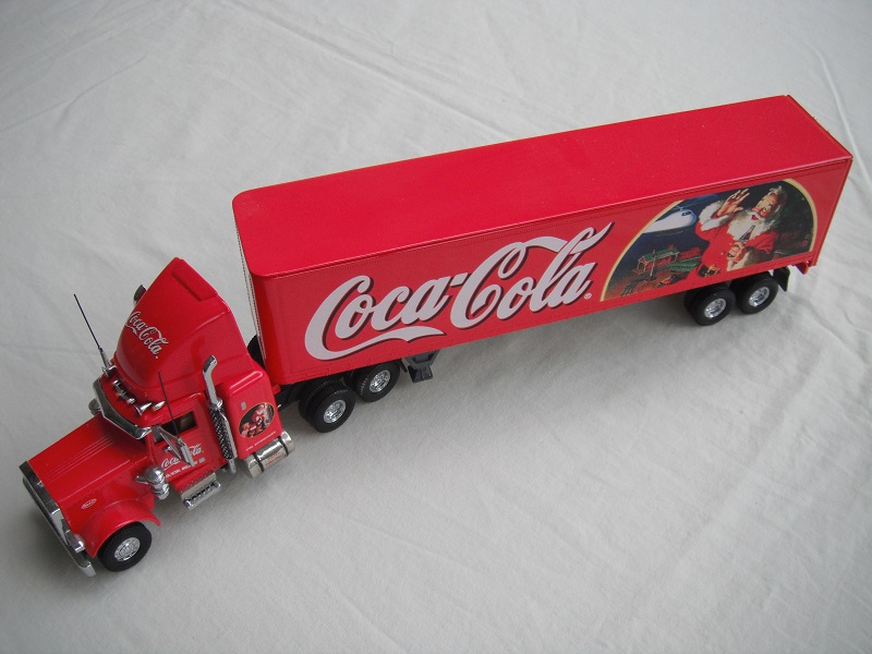 1. Red cab/black chassis/black rubber tires/red container/silver gray chassis/&quot;Coca Cola&quot; &amp; Santa Claus tempa.