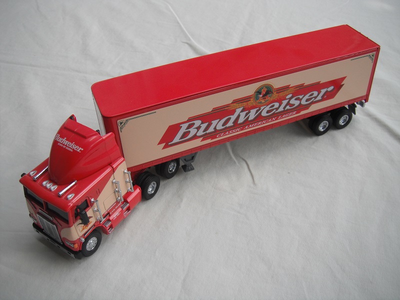 1. Red cab &amp; chassis/black rubber tires/red container/dark gray chassis/&quot;Budweiser&quot; tempa.