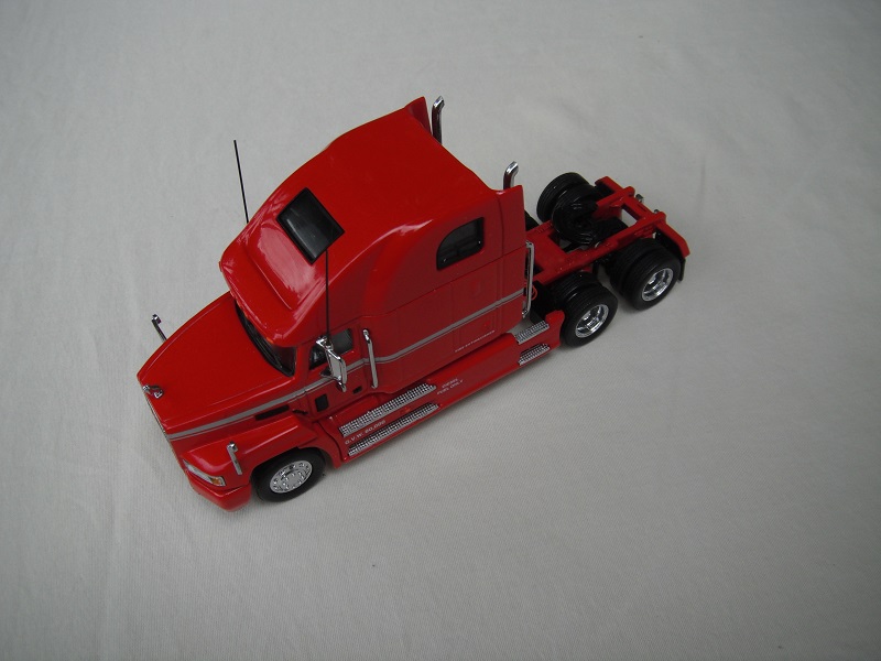 1. Red cab/red chassis/black rubber tires.