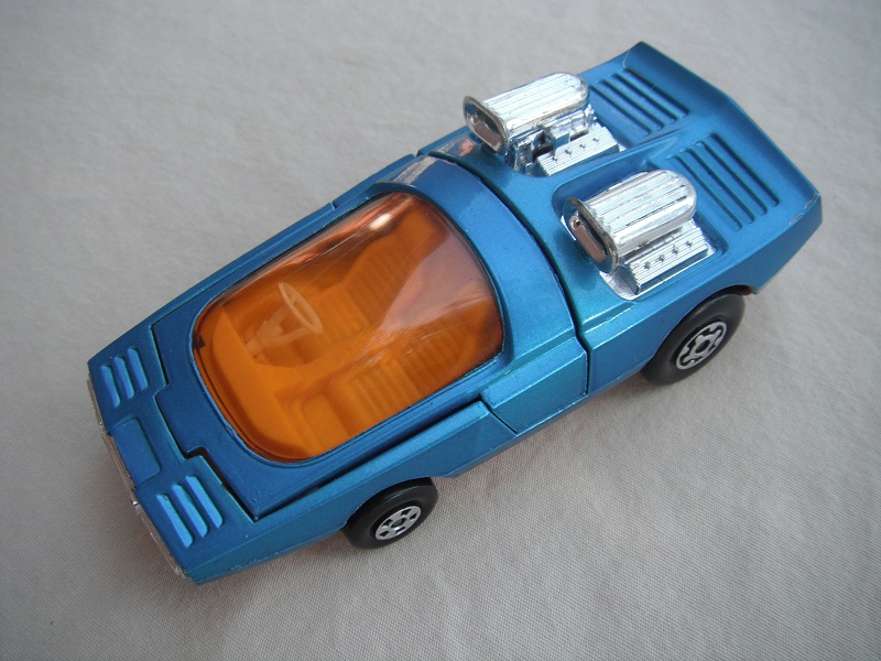 8. Metallic blue body/K36/K41 dk.red base/amber windshield/orange-yellow interior.